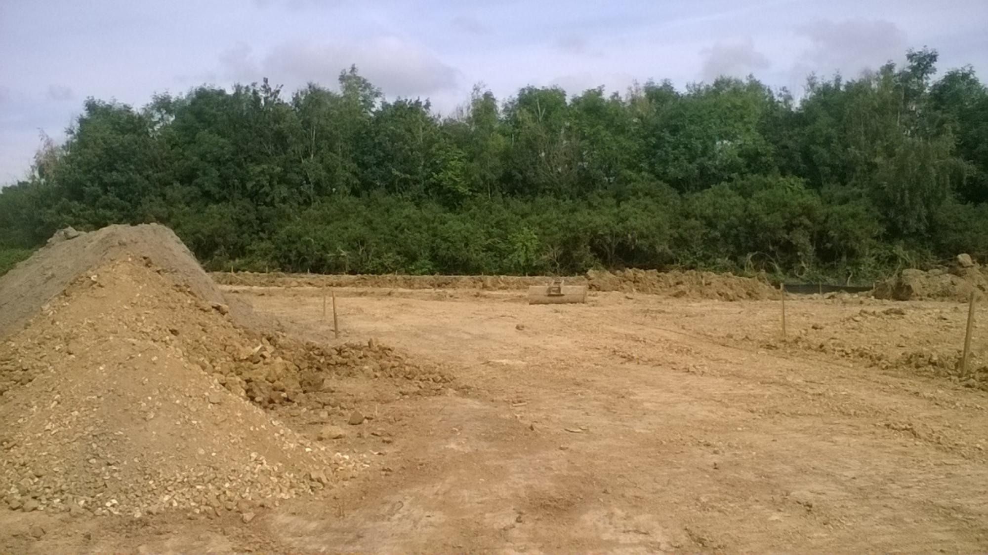Zone B prepared with topsoil stockpiled to be reused.